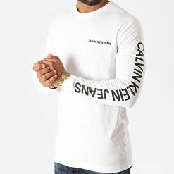 Meilleure vente 🔔 Tee 👚 Shirt Manches Longues Essential Institutional 6884 Blanc de Calvin Klein 😀