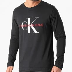 Grosses soldes 🛒 Tee 👚 Shirt Manches Longues Monogram 9224 Noir de Calvin Klein ❤️
