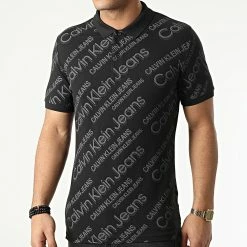 Sortie 😍 Polo Manches Courtes Logo AOP 9673 Noir de Calvin Klein 🧨
