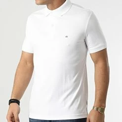De gros 🌟 Polo Manches Courtes Liquid Touch Slim 7090 Blanc de Calvin Klein 🥰