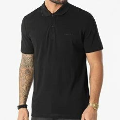 Grosses soldes ❤️ Polo Manches Courtes A Bandes Tonal Logo Tape 8071 Noir de Calvin Klein 🛒