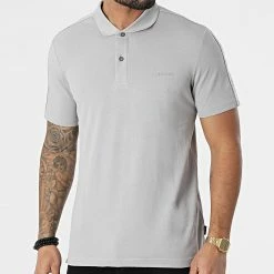 Coupon 😍 Polo Manches Courtes Tonal Logo Tape 8071 Gris de Calvin Klein ⌛
