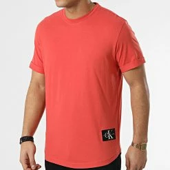 Offres ⌛ Tee 👚 Shirt Oversize Badge Turn Up Sleeve 5319 Orange Foncé de Calvin Klein 🧨