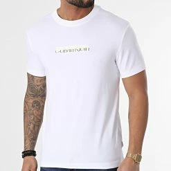 Remise ✔️ Tee 👚 Shirt Multi Color Logo 8834 Blanc de Calvin Klein 🎁