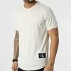Grosses soldes 🤩 Tee 👚 Shirt Oversize Badge Turn Up Sleeve 5319 Beige de Calvin Klein 😍