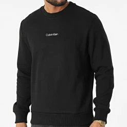 Tout neuf 🔔 Sweat Crewneck Interlock Micro Logo 9431 Noir de Calvin Klein 🎉
