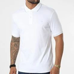 Tout neuf 😍 Polo Manches Courtes Logo Jacquard Cuff 9960 Blanc de Calvin Klein 🔔