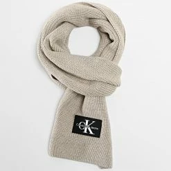 Budget 🤩 Echarpe Monologo 9906 Beige de Calvin Klein 😀