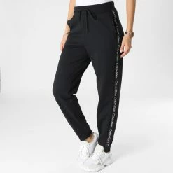Vente flash ✔️ Pantalon Jogging A Bandes Femme GWF2P601 Noir de Calvin Klein 🤩