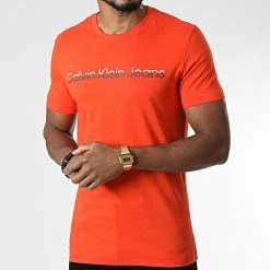 Remise 🔔 Tee 👕 Shirt Mixed Institutional 0878 Orange de Calvin Klein 😍