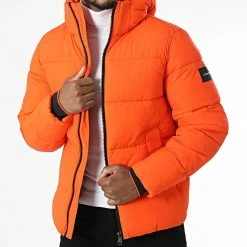 Grosses soldes 😍 Doudoune Capuche Crinkle Nylon Puffer 0336 Orange de Calvin Klein ✔️